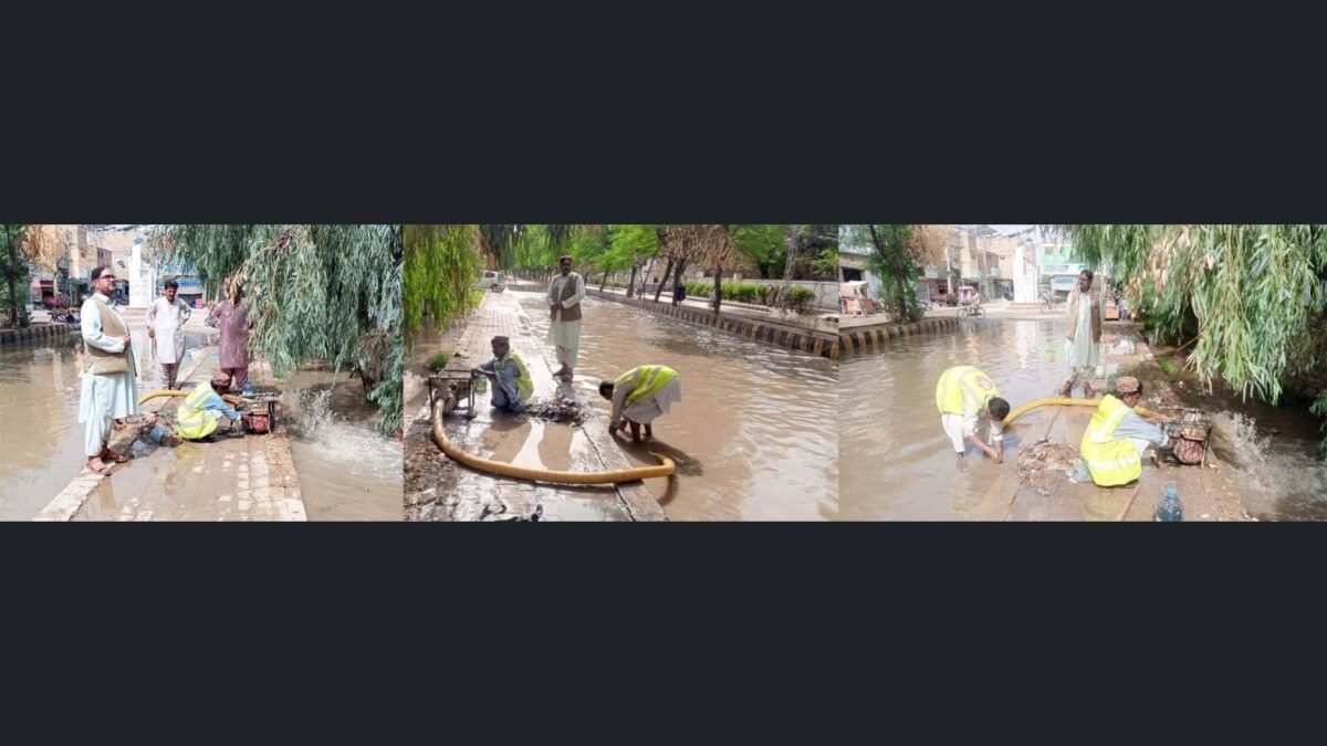 Sibi municipal staff pump out rainwater with dewatering machines